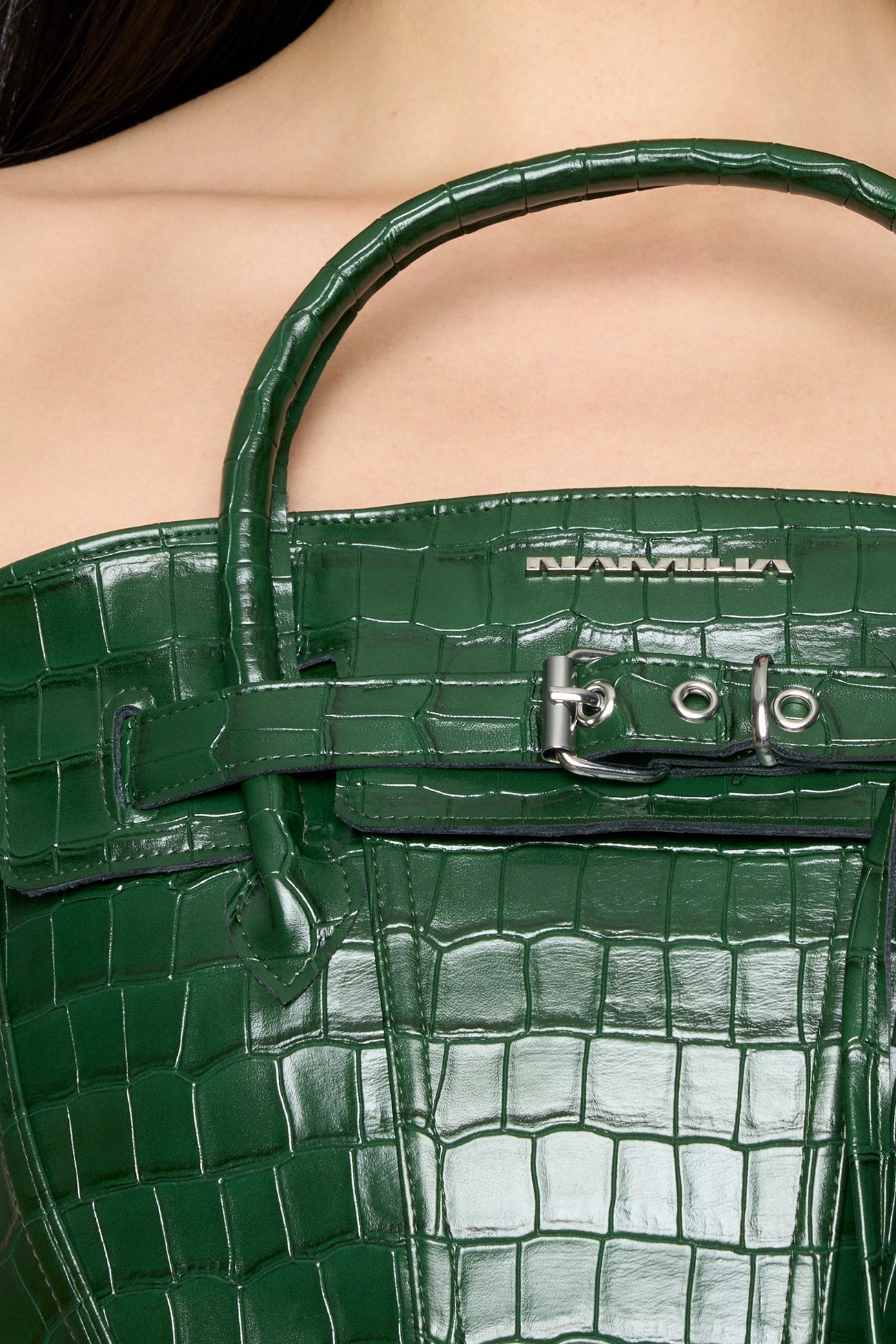 model wearing green croc pu leahter corset with handbag design