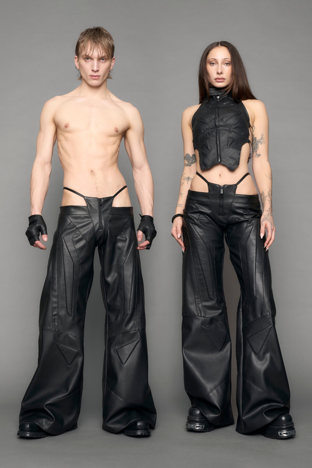 model wearing black vegan leather thong pants