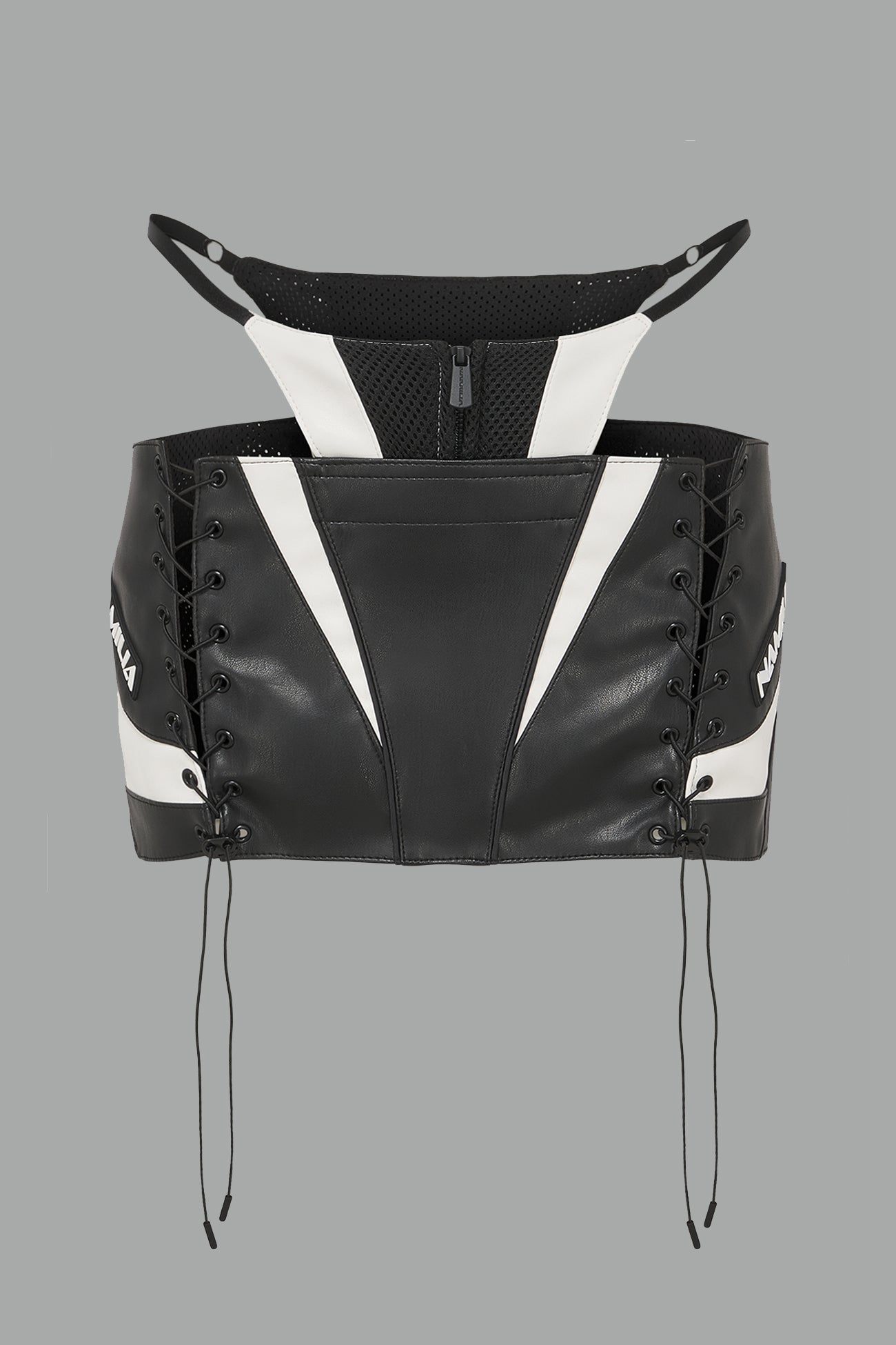 white vegan leather moto thong mini skirt with lace-up sides, cut-out hips, and zip front – edgy Y2K streetwear skirt for clubwear or festival looks.