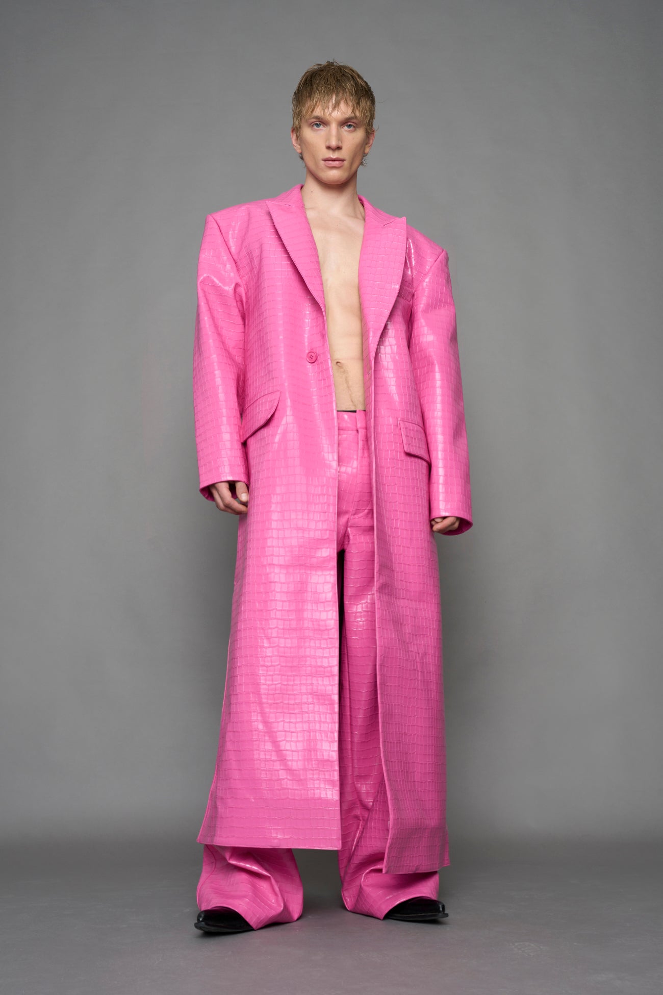 model wearing pink vegan croc leather long blazer coat