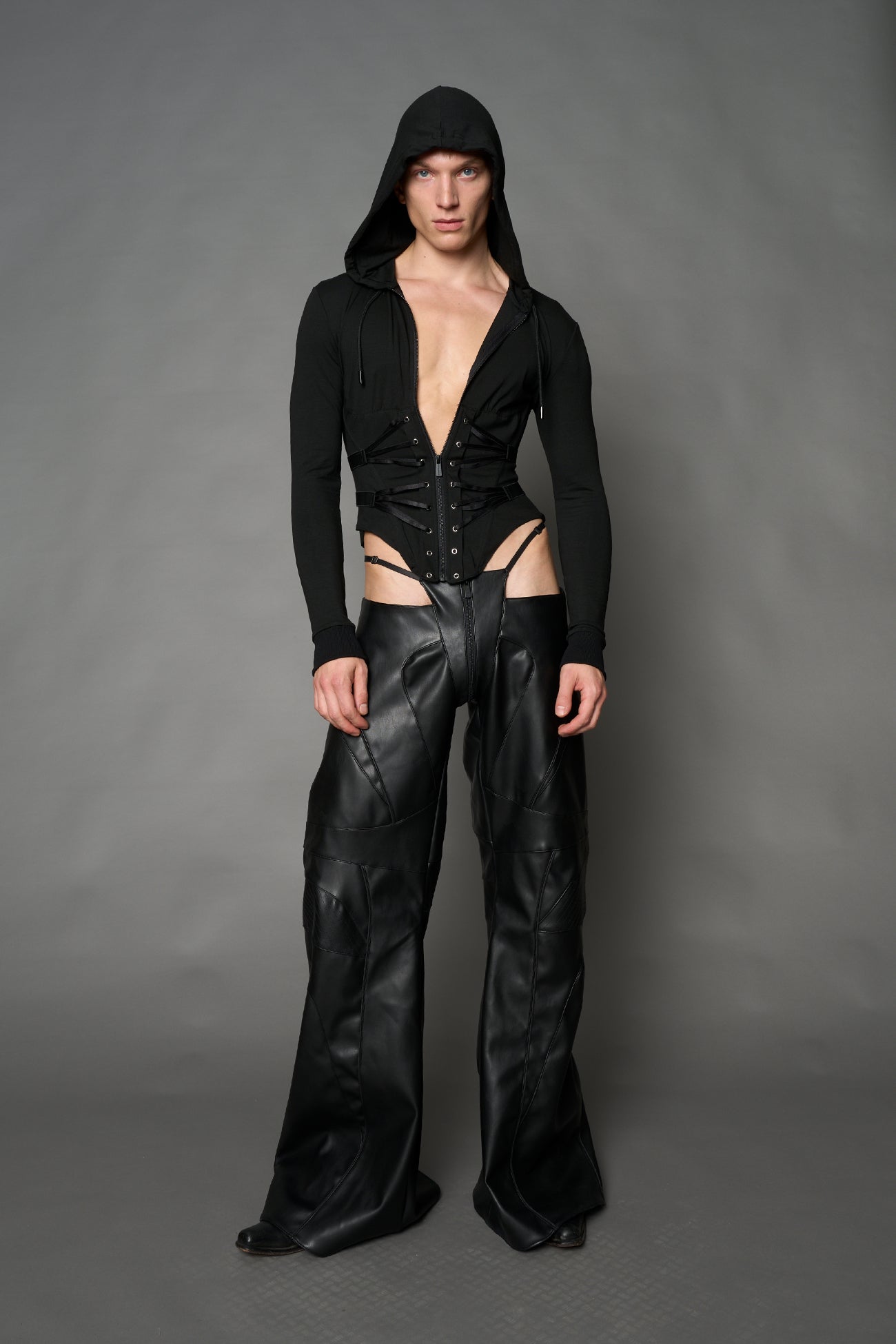 Black Namilia zip-up hoodie with built-in corset, lace-up front, cut-out sides and drawstring hood