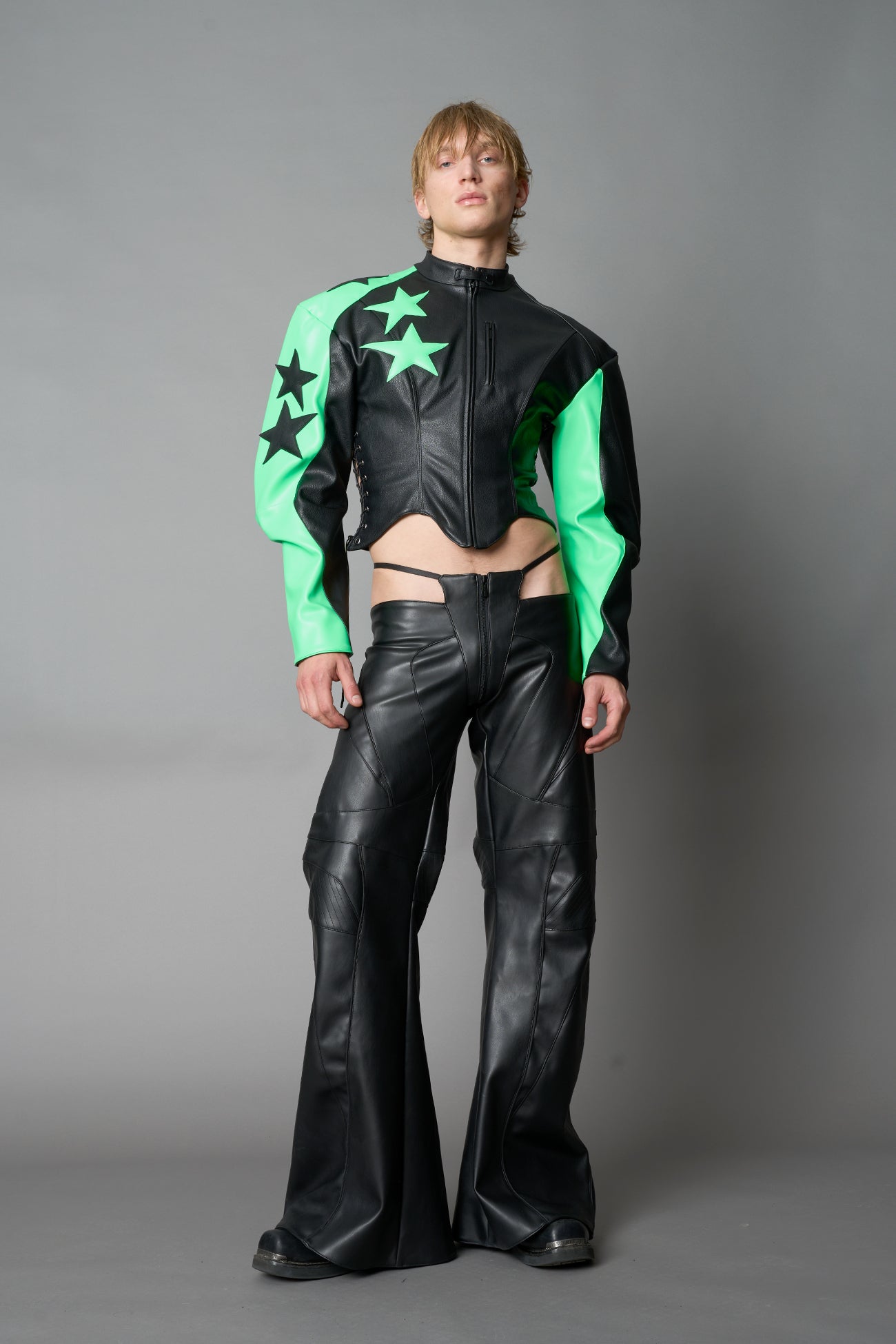 Green Namilia motocross jacket – streetwear biker jacket with bold star graphics, zip front, and edgy moto-inspired fashion design in vegan PU leather