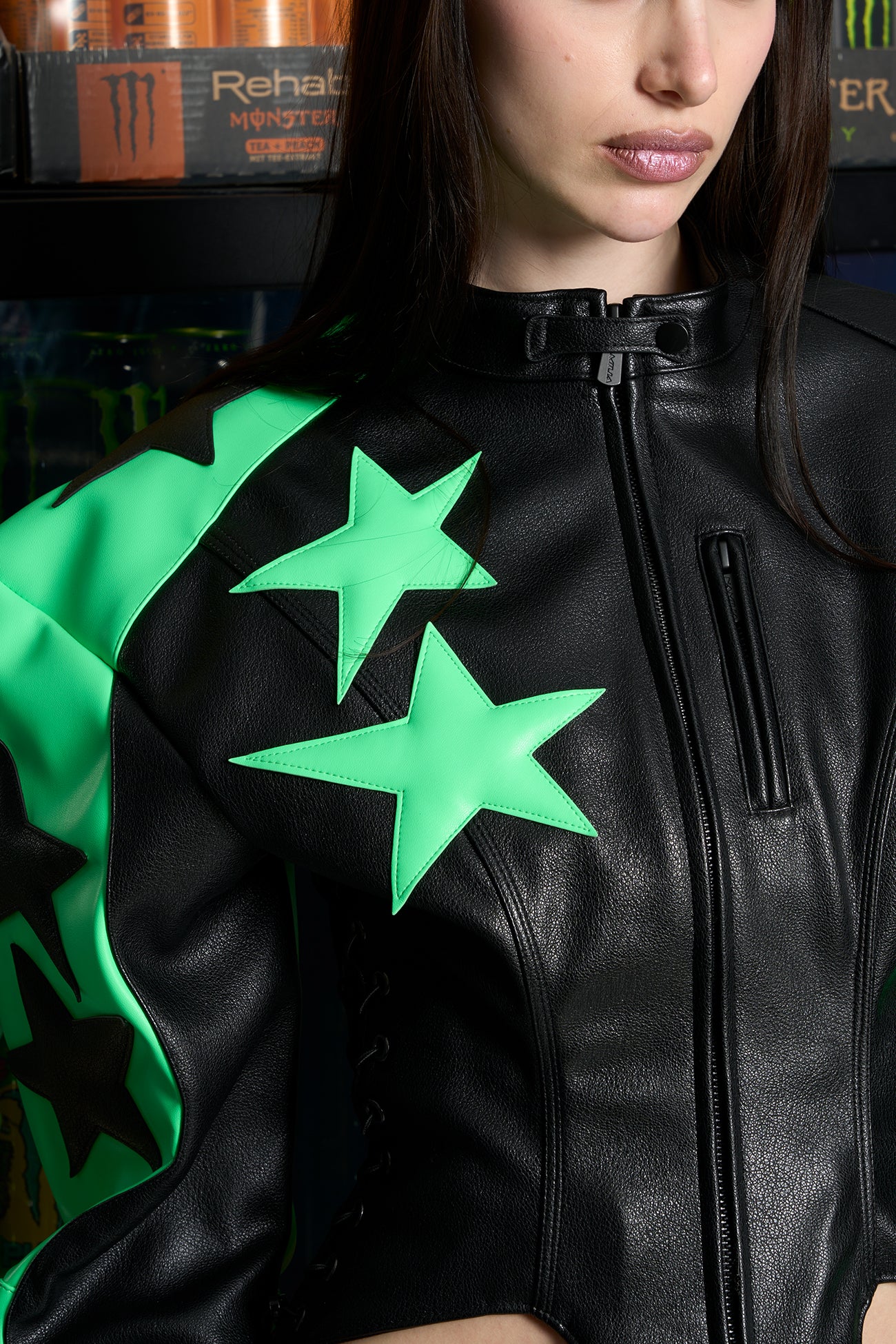 Green Namilia motocross jacket – women's streetwear biker jacket with bold star graphics, zip front, and edgy moto-inspired fashion design in vegan PU leather