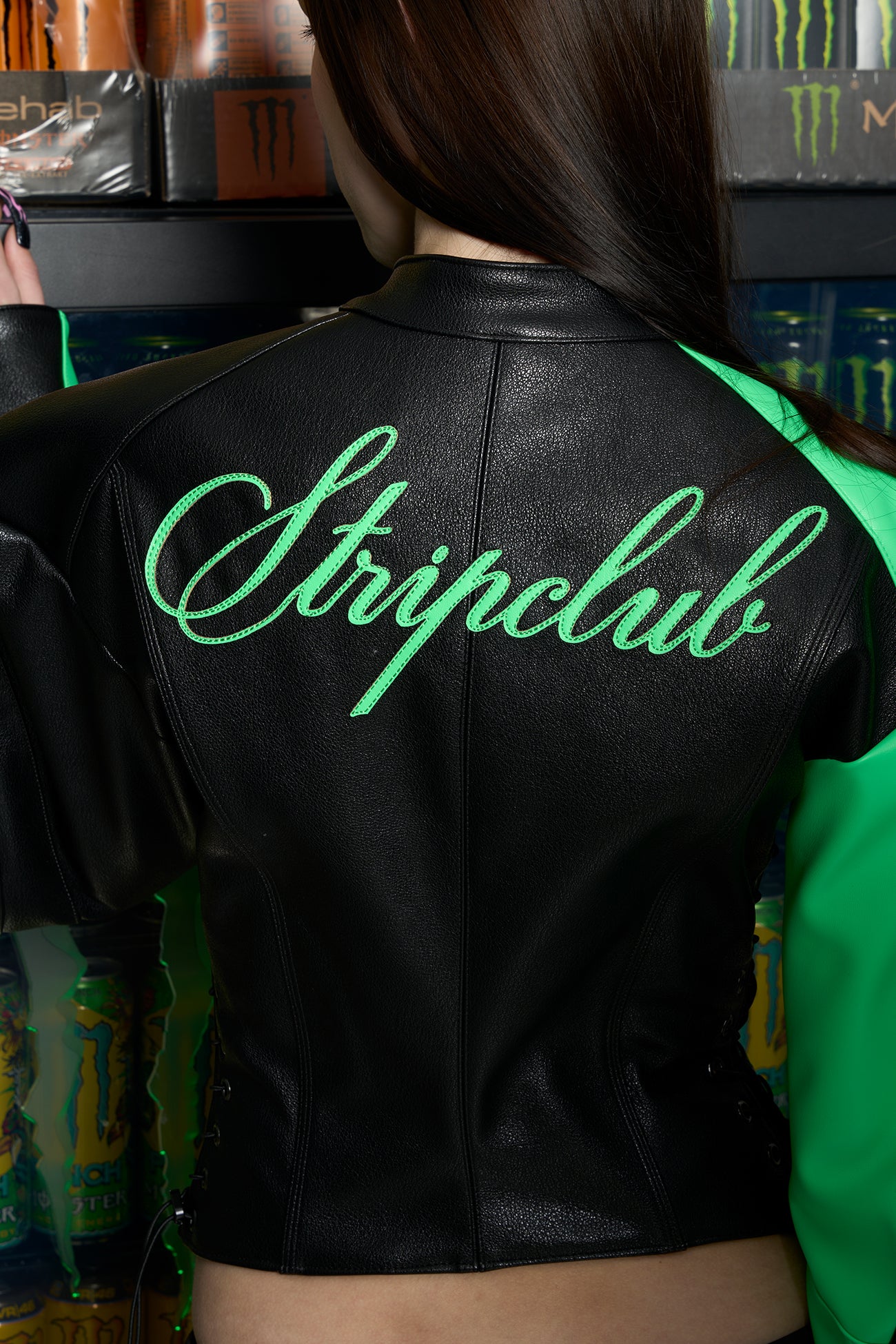 Green Namilia motocross jacket – women's streetwear biker jacket with bold star graphics, zip front, and edgy moto-inspired fashion design in vegan PU leather