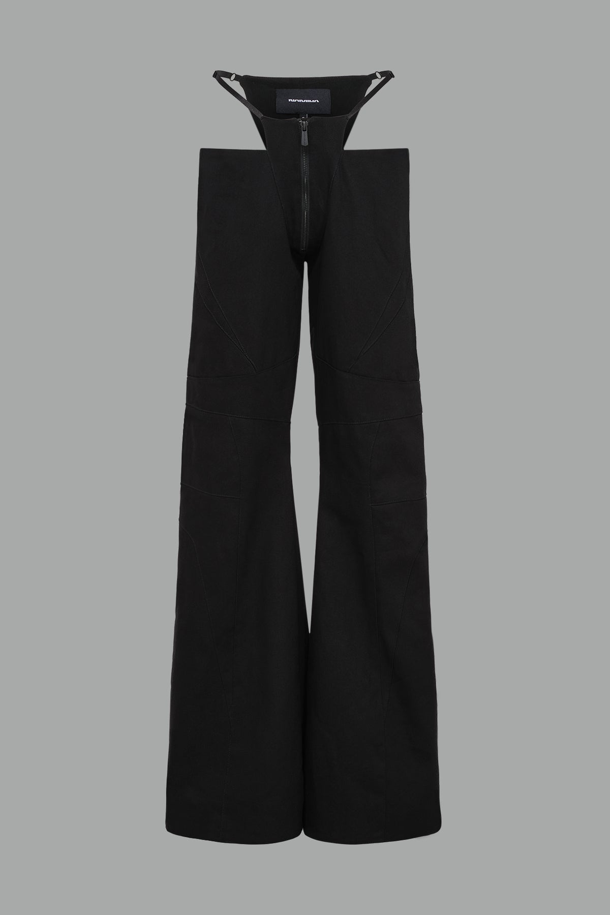 Low-rise flared pants in black cotton twill with bold side cut-outs and thong strap detailing.