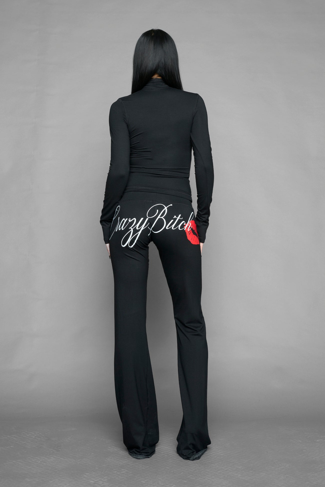 black crazy jersey zip up jacket with and back graphic print on model studio ecom photo