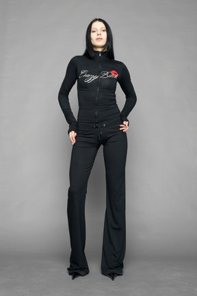 black crazy jersey zip up jacket with and back graphic print on model studio ecom photo