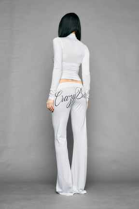 white crazy jersey zip up jacket with and back graphic print on model studio ecom photo