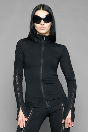 black hook and eye zip up jacket in soft jersey fabric with fitted silhouette worn by model studio ecommerce image