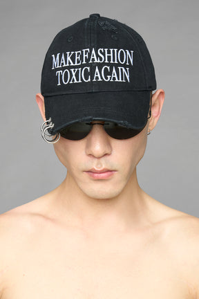 slogan black cap with distressind and silver rings
