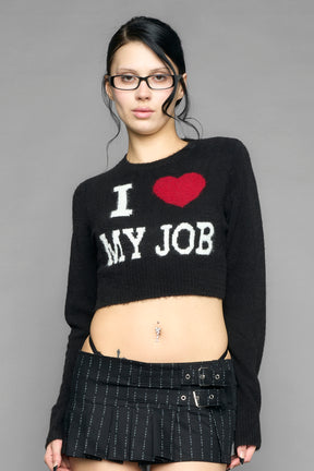 model wearing intarsia knit wool sweater cropped length black