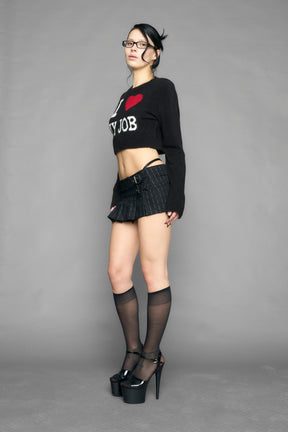model wearing intarsia knit wool sweater cropped length black