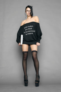black off shoulder mini dress with long sleeves and statement text print worn by model studio ecommerce image