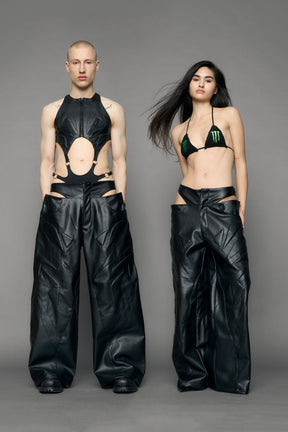 models wearing black pu leather trousers with thong design and moto style highlights