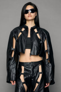 model wearing black moto pu leather jacket with cut out design