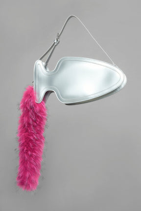 silver butt plug bag with adjustable strap and faux fur detail worn as shoulder bag studio ecommerce image
