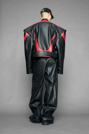 black red power shoulder moto jacket with extreme sculpted shoulders and integrated boning construction worn by models studio ecommerce image