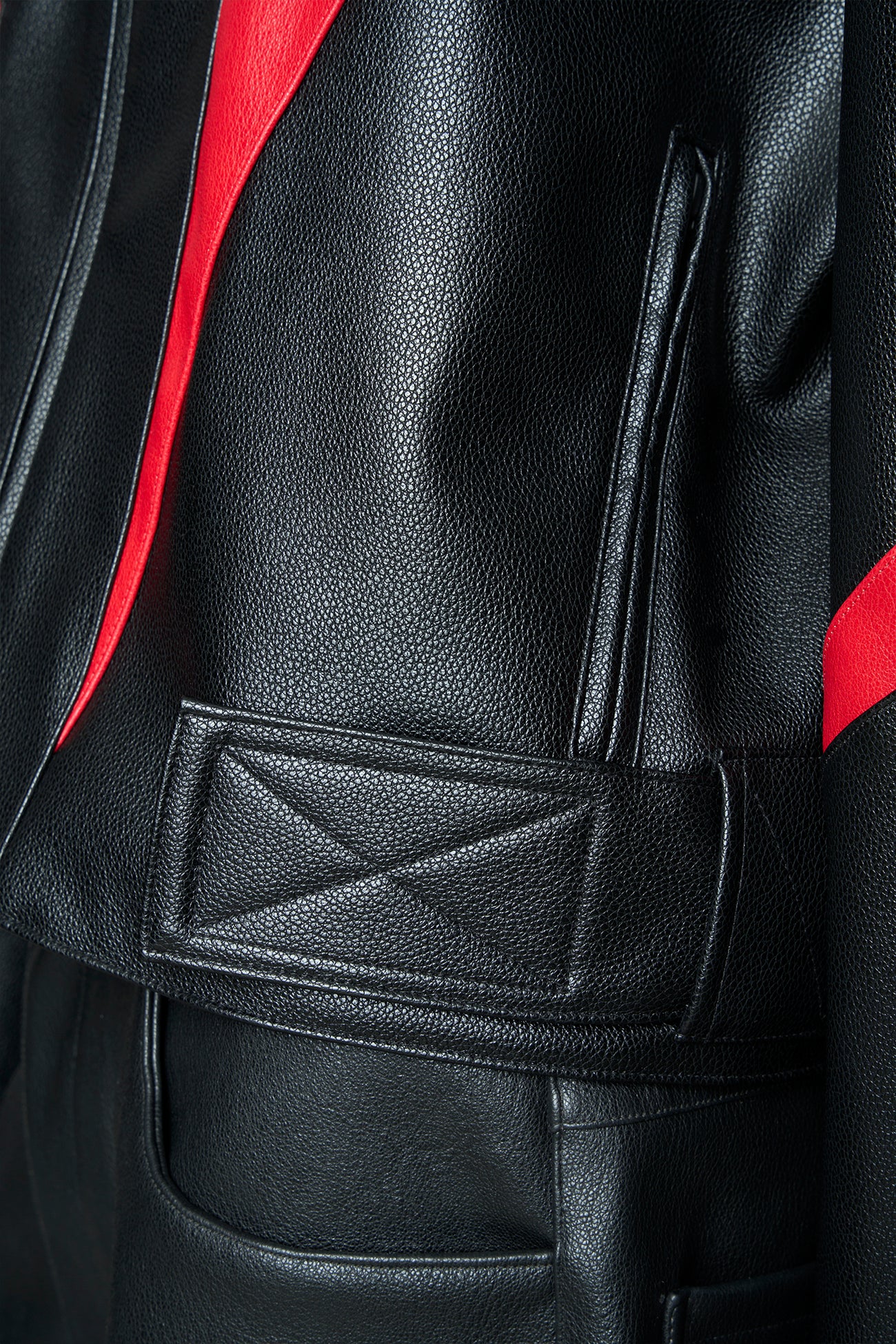 black red power shoulder moto jacket with extreme sculpted shoulders and integrated boning construction worn by models studio ecommerce image