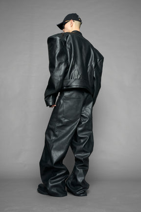 black power shoulder moto jacket with extreme sculpted shoulders and integrated boning construction worn by models studio ecommerce image