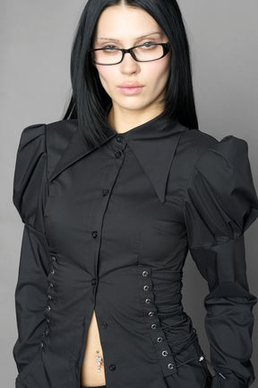 black puff shoulder blouse with corset lace up sides and button front worn by model studio ecommerce image