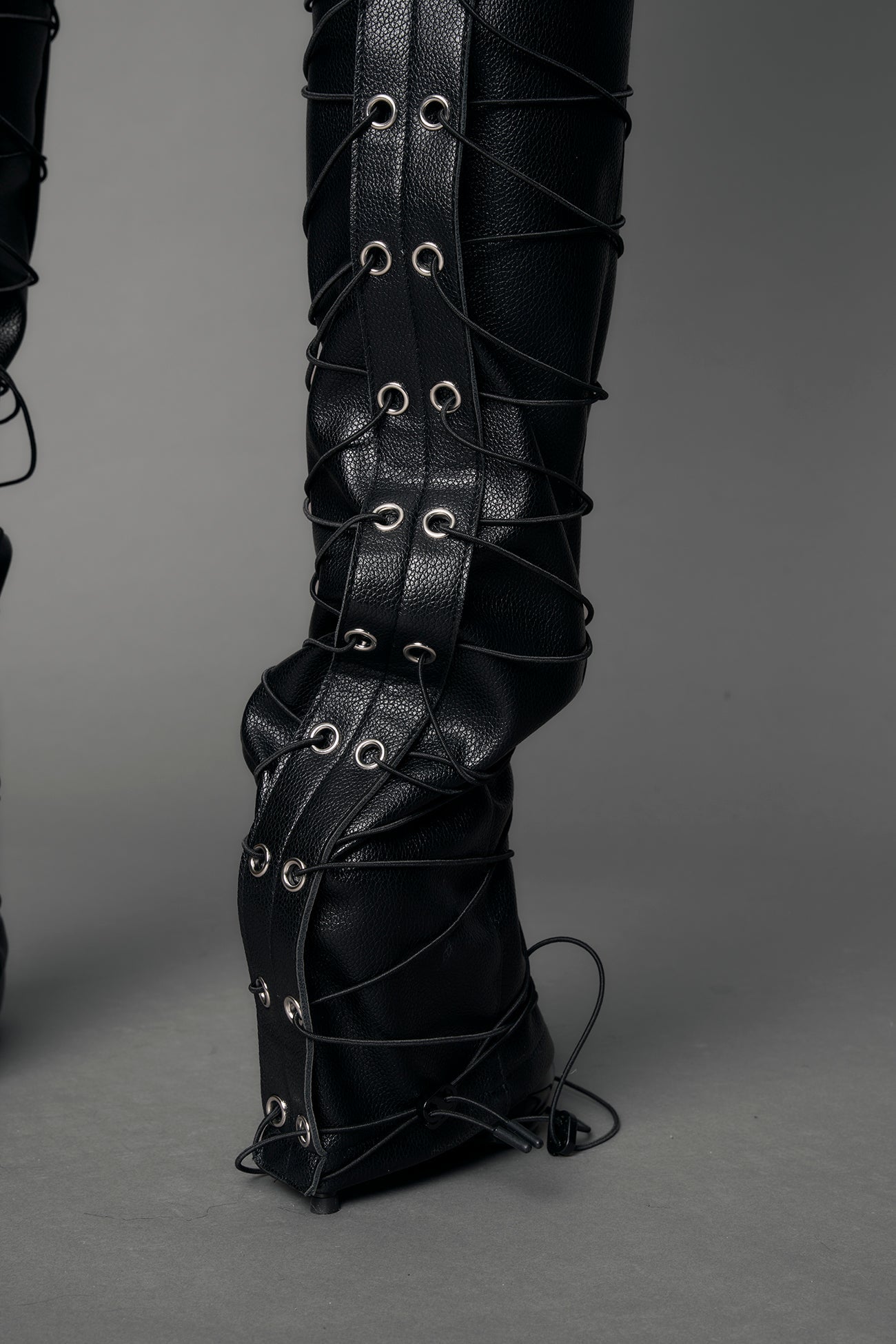black leather pants with string