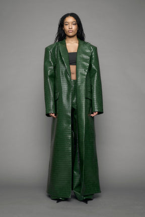 model wearing green vegan leather croc blazer coat