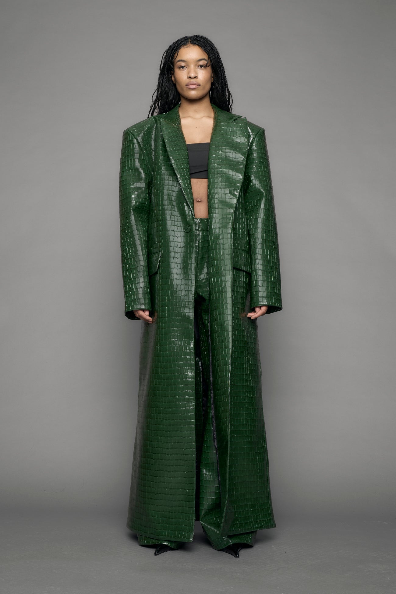 model wearing green vegan leather croc blazer coat
