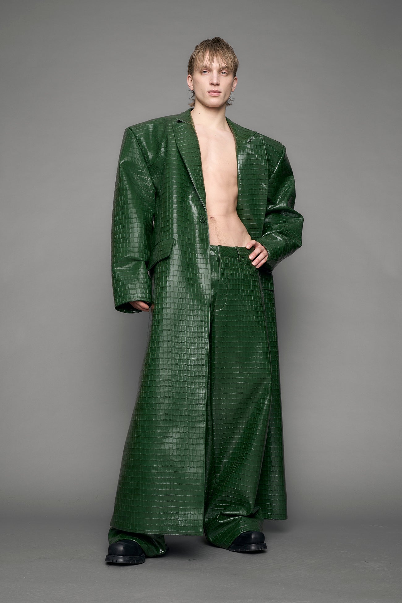 model wearing green vegan leather croc blazer coat