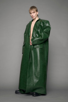 model wearing green vegan leather croc blazer coat
