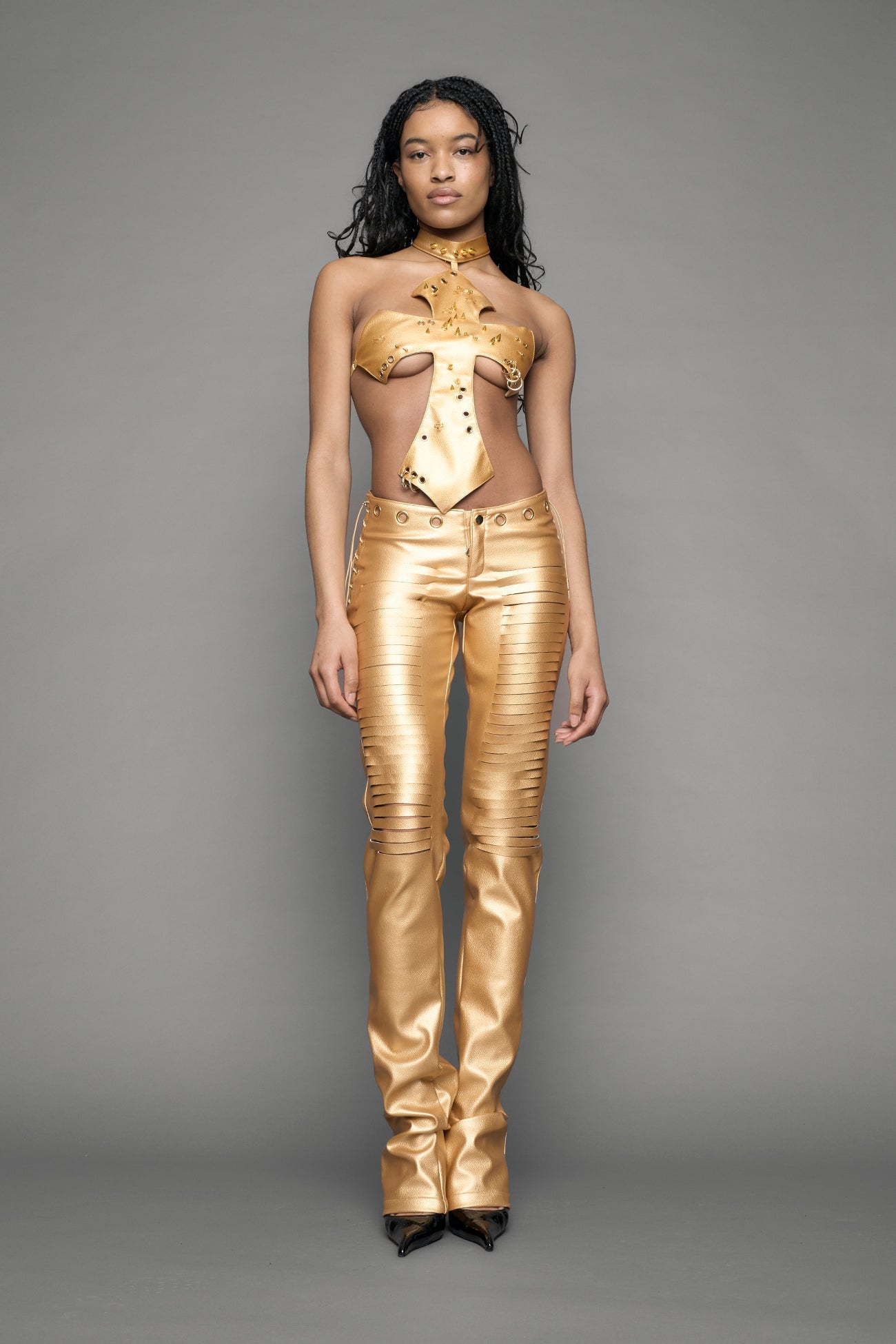 gold vegan leather pants with cuts