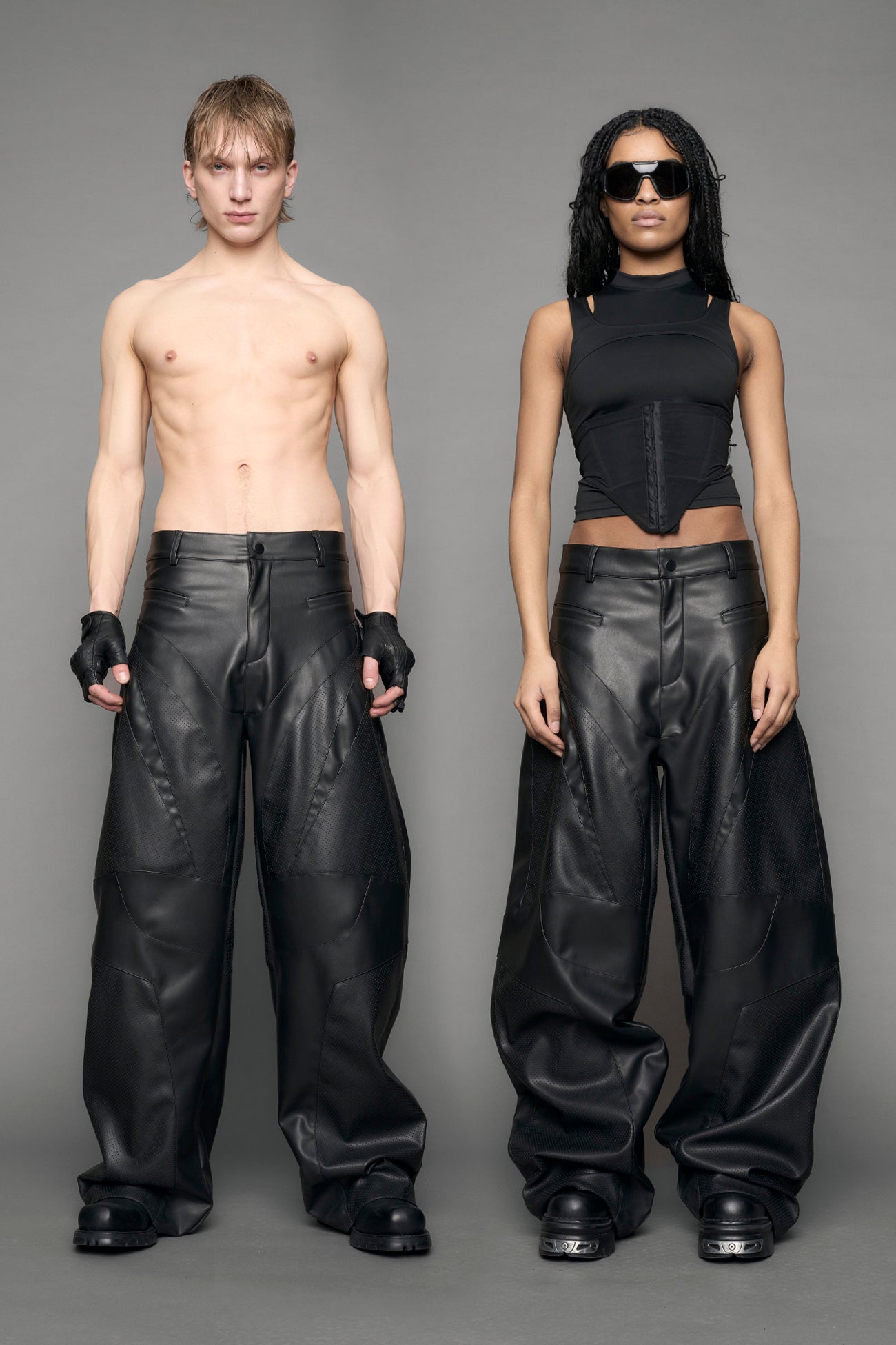 model wearing black vegan moto inspired baggy pants