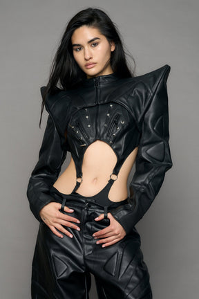 Model wearing a black leather choker jacket with cut-out design 