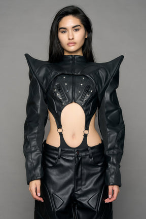 Model wearing a black leather choker jacket with cut-out design 