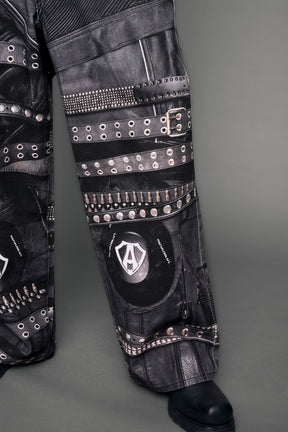 model wearing black printed motocross denim pants