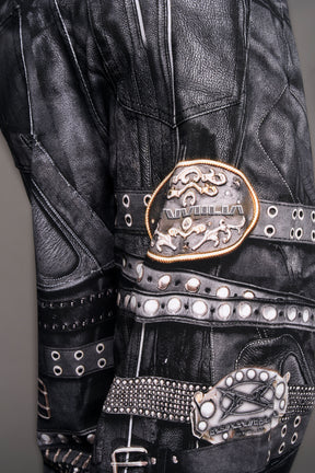 model wearing black printed motocross denim pants