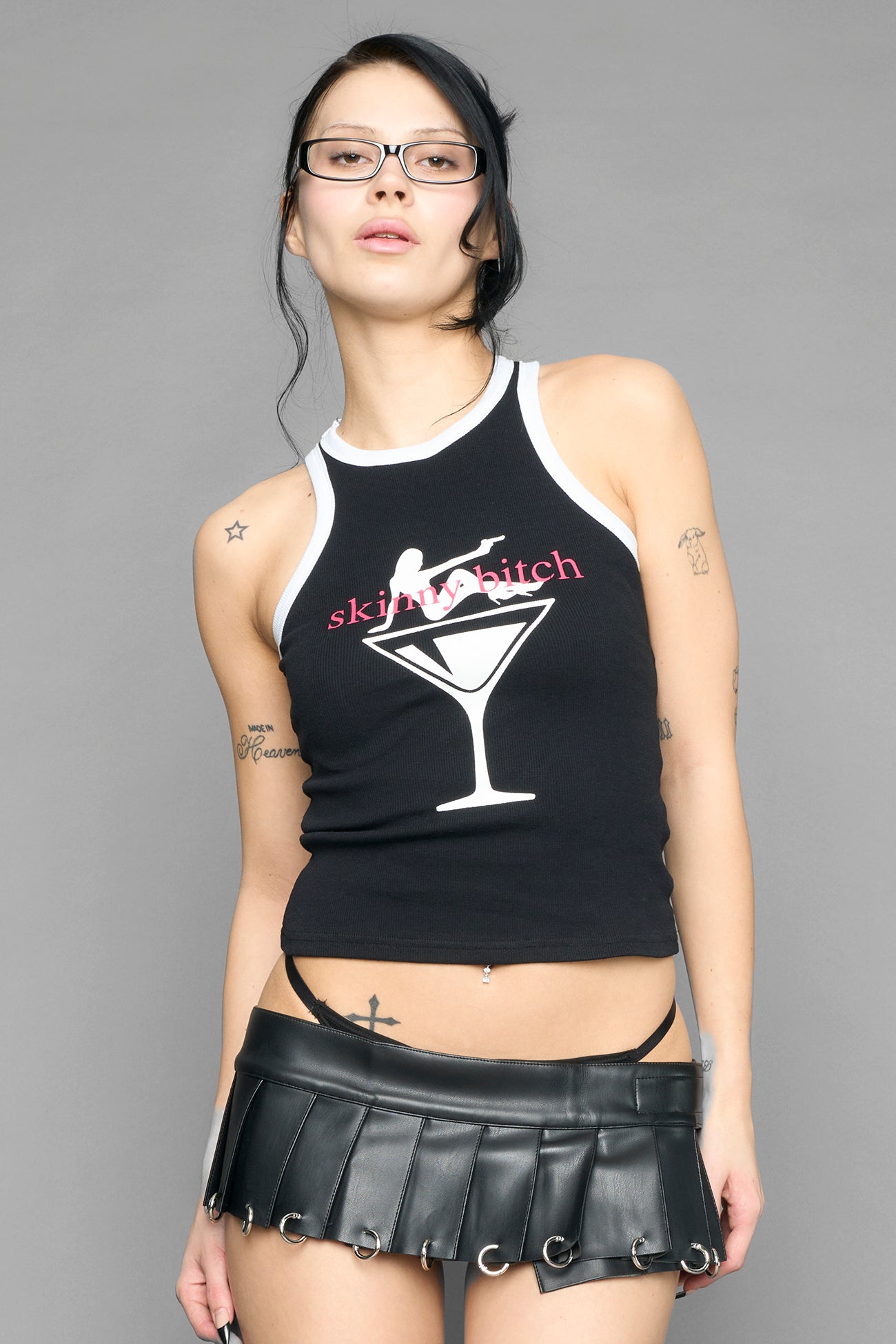 Black tank top with graphic design and text on a gray background