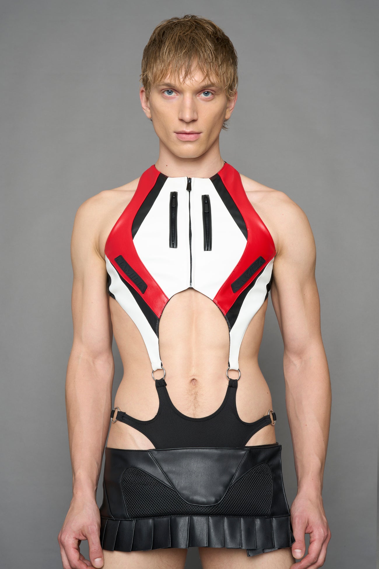 model wearing red white black moto inspired cut out body