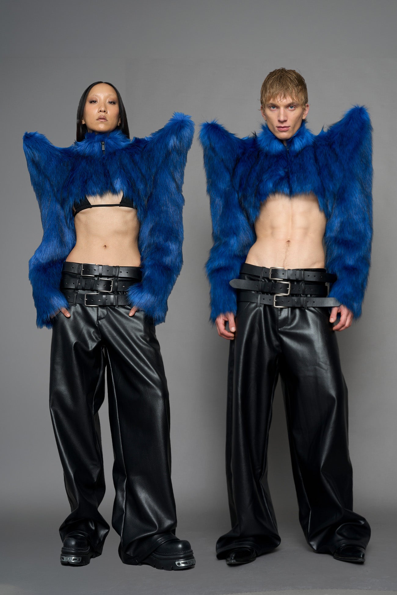 model wearing blue faux fur bolero jacket