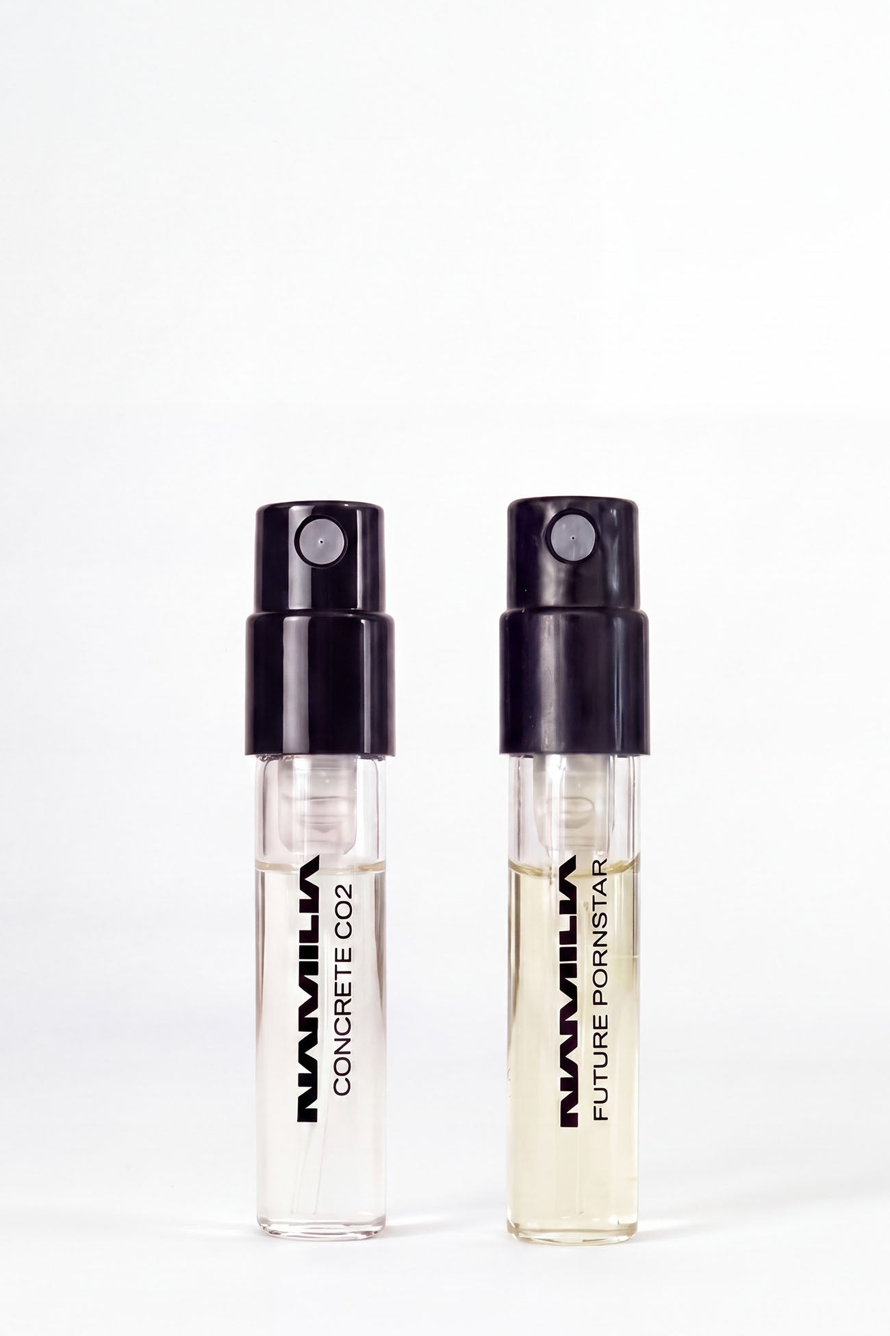 two NAMILIA Parfum tester with black cap and future pornstar and concrete filled inside