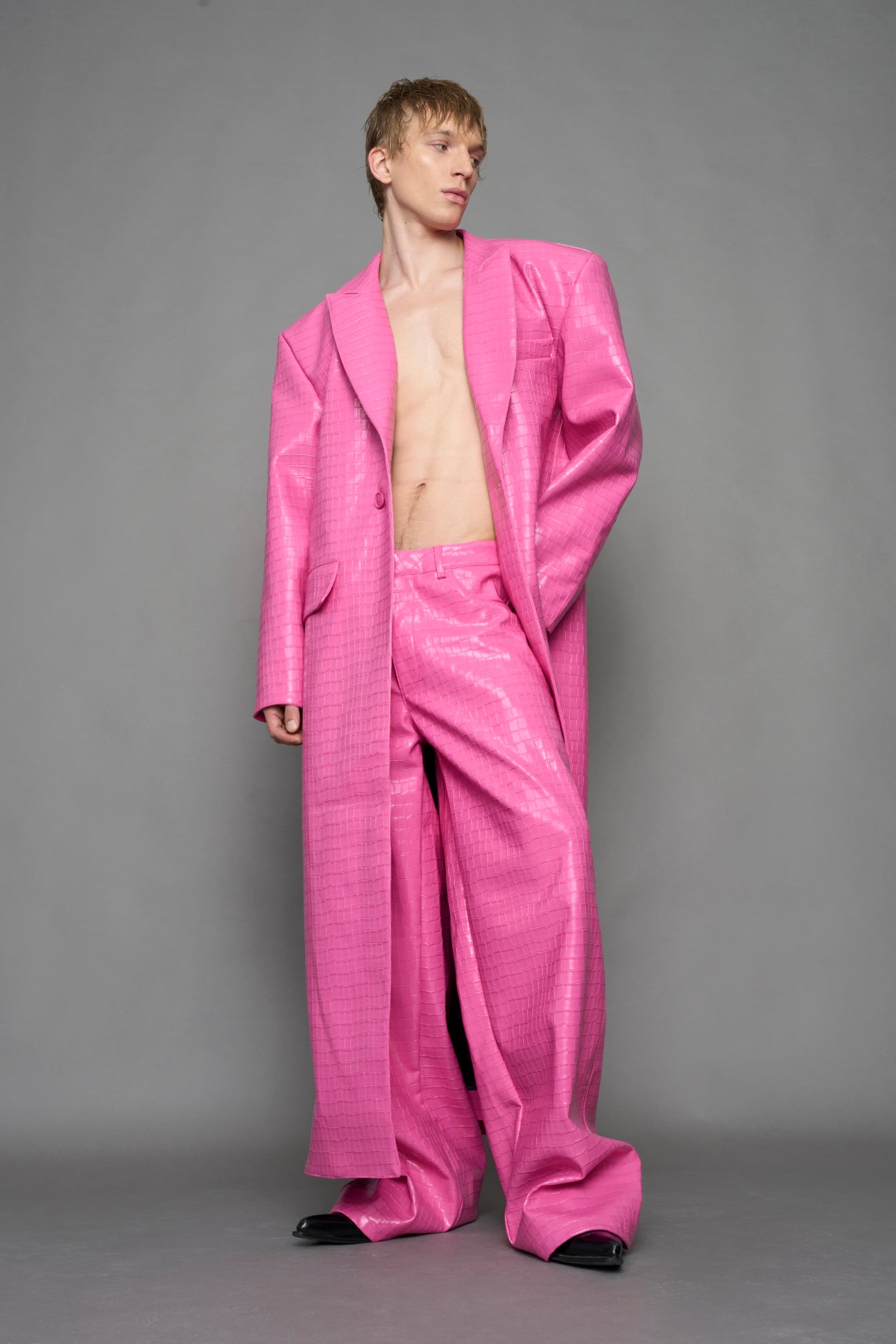 model wearing pink vegan croc leather long blazer coat 