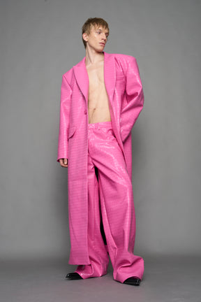 model wearing pink vegan croc leather long blazer coat 