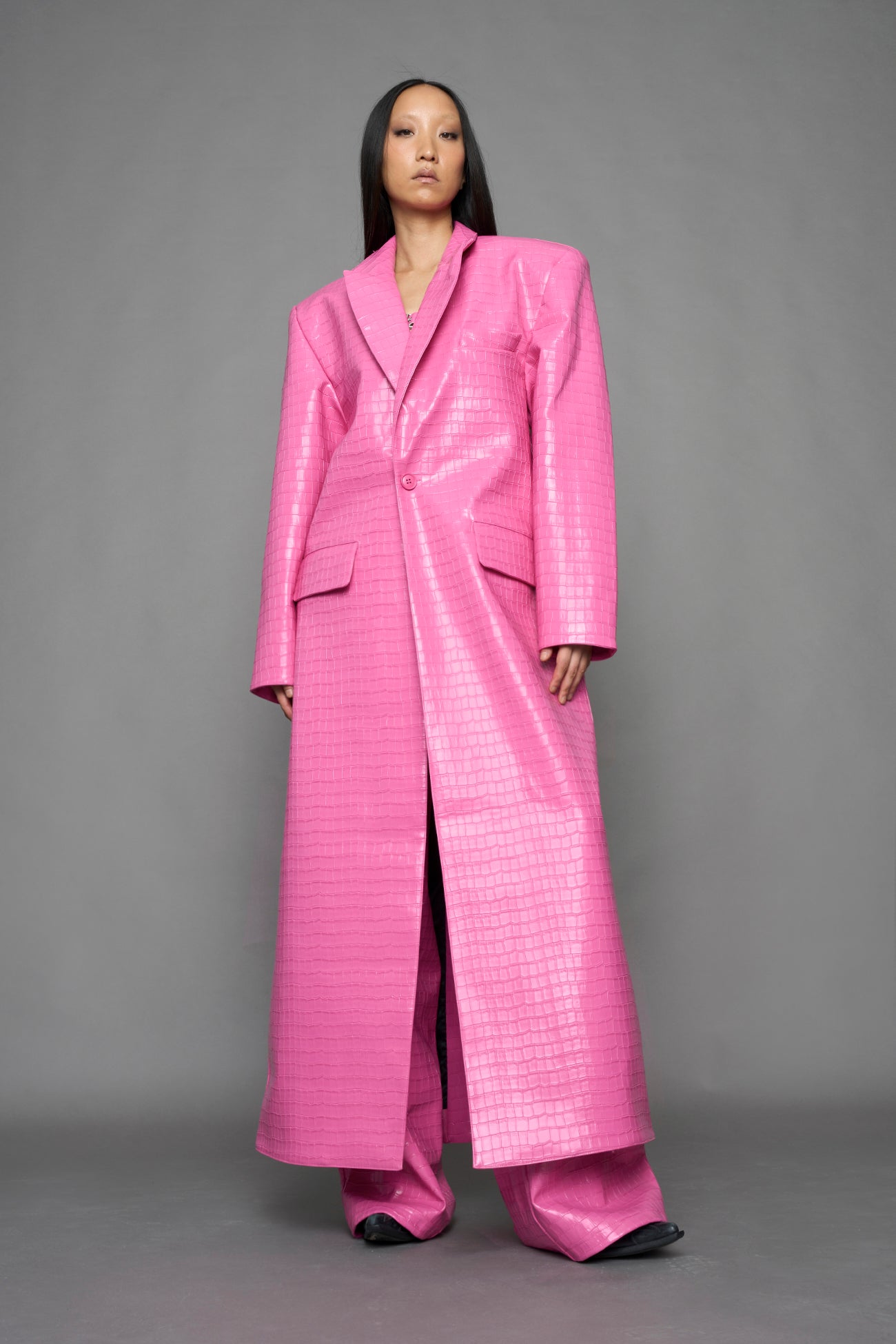 model wearing pink vegan croc leather long blazer coat 