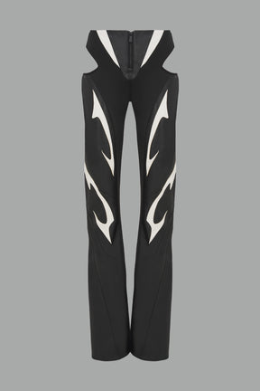 white cut-out flare pants with graphic details, vegan leather panels, and low-rise waist – edgy motocross-inspired trousers for men’s streetwear or festival looks.