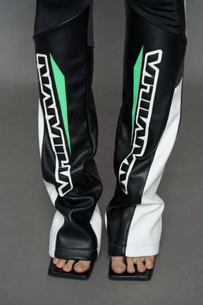 two models wearing black white green moto inspired mesh pants with logo on the leg