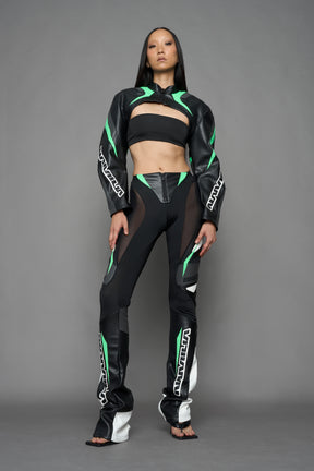 two models wearing black white green moto inspired mesh pants with logo on the leg
