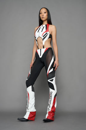 model wearing red white black moto inspired cut out body