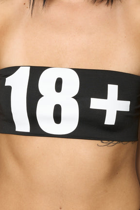 Namilia black Lycra tube top with bold “18+” print on front