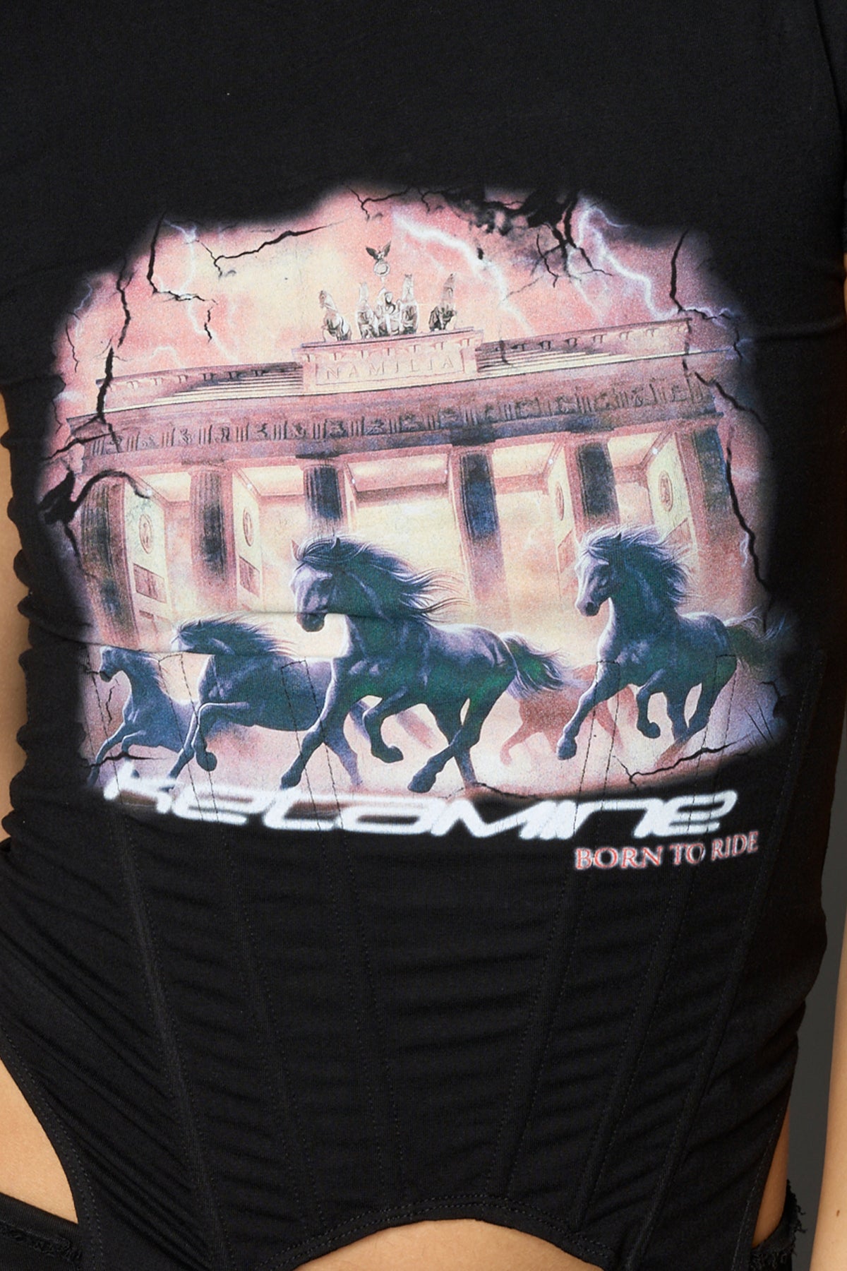 Namilia K mini tee in black with galloping horsesr graphic and detachable suspender straps