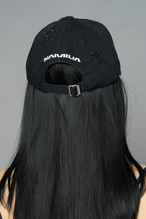 model wearing black red slogan embroidered rtrucker cap with silver ring details