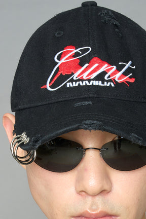 model wearing black red slogan embroidered rtrucker cap with silver ring details